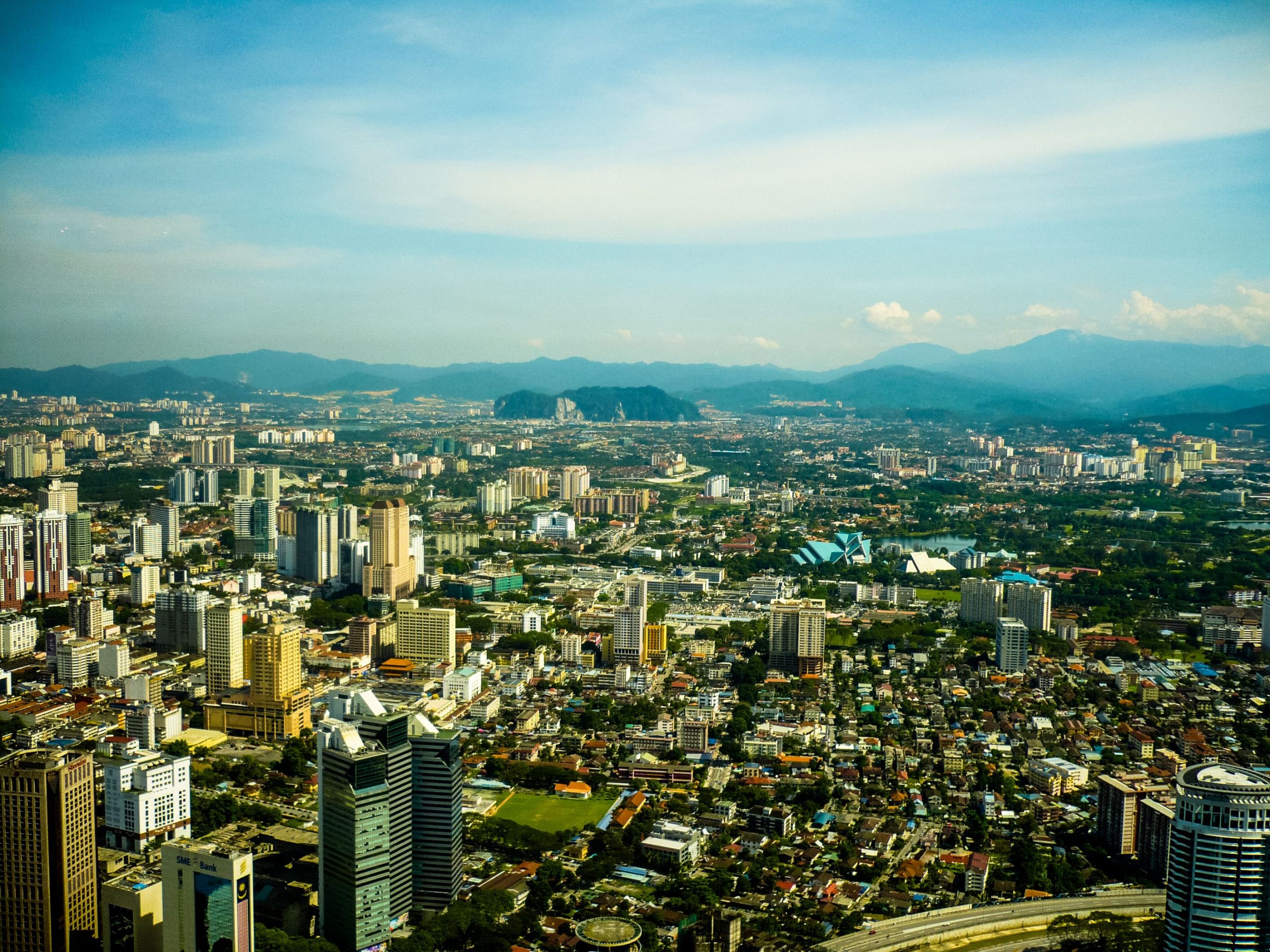 Aerial view of Kuala Lumpur's dense skyline and high-rise development in Malaysia