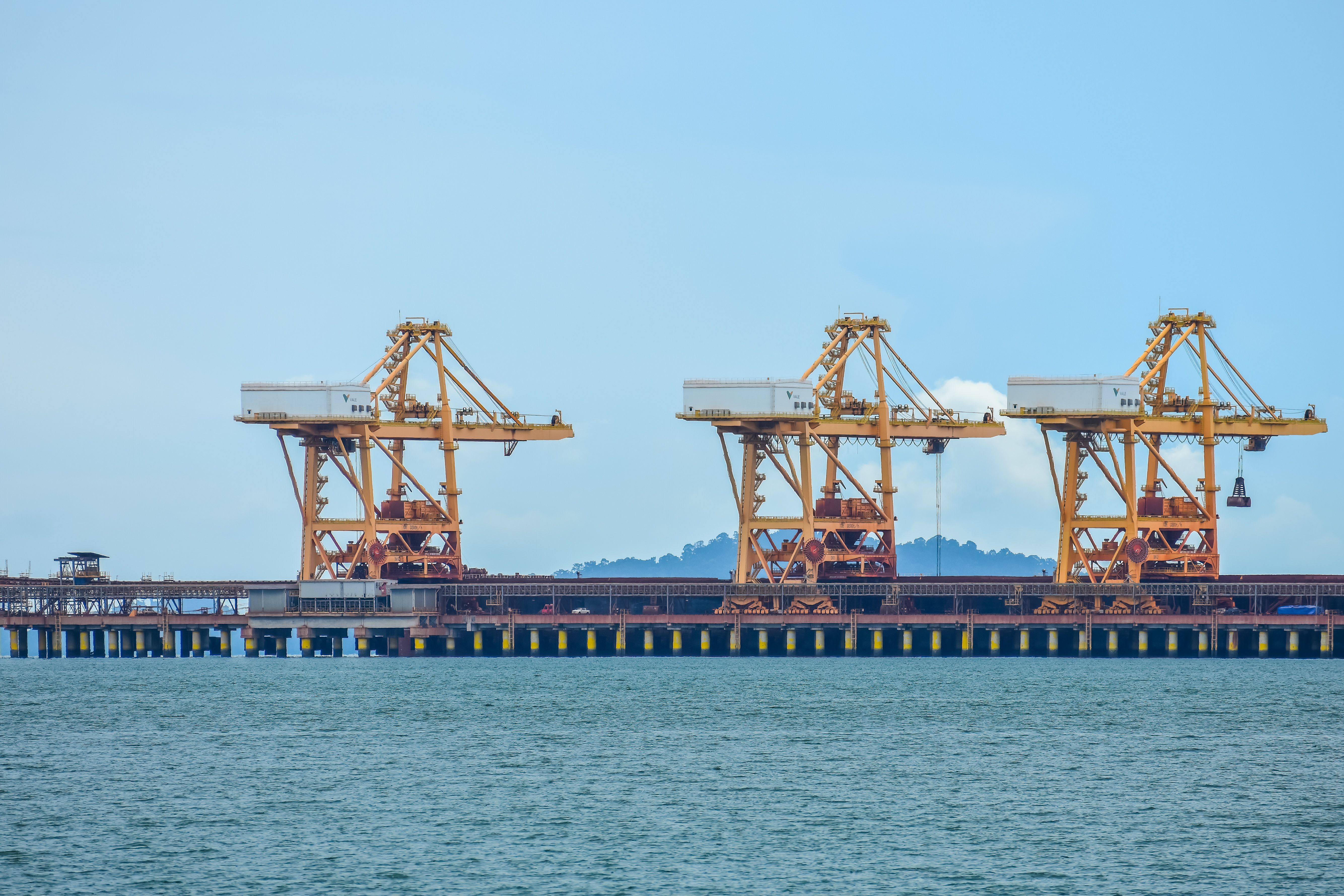 Industrial port cranes in Lumut, Malaysia, representing maritime infrastructure and economic development